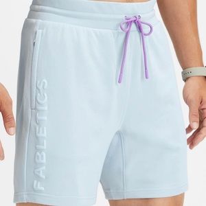 Fabletics The Go-To Short Unopened! Small Blue Ash 7 inch inseam. Waist 29-31.
